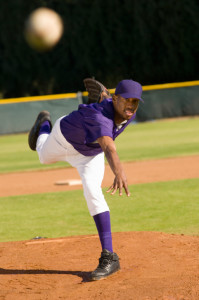 Pitcher Throwing Baseball Towards Batter